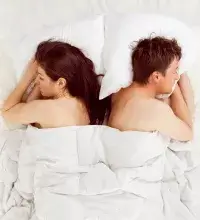 Zelfhulp Relatieproblemen - paar ligt met de rug naar elkaar toe in bed